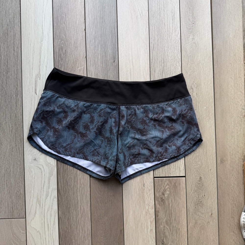 Vuori Women's Athletic Shorts in Black and Blue